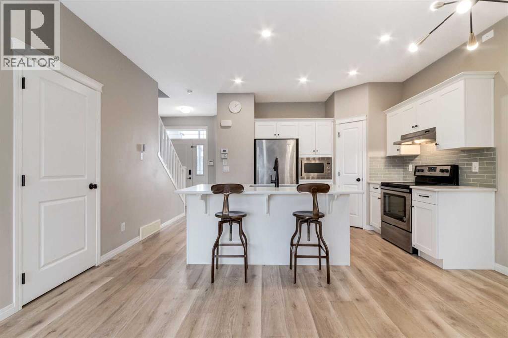 730 Belmont Drive SW, Calgary, Alberta  T2X 4H3 - Photo 5 - A2286204