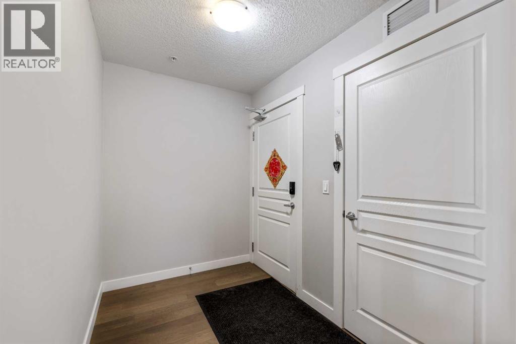 201, 2300 Evanston Square NW, Calgary, Alberta  T3P 0G8 - Photo 3 - A2288705
