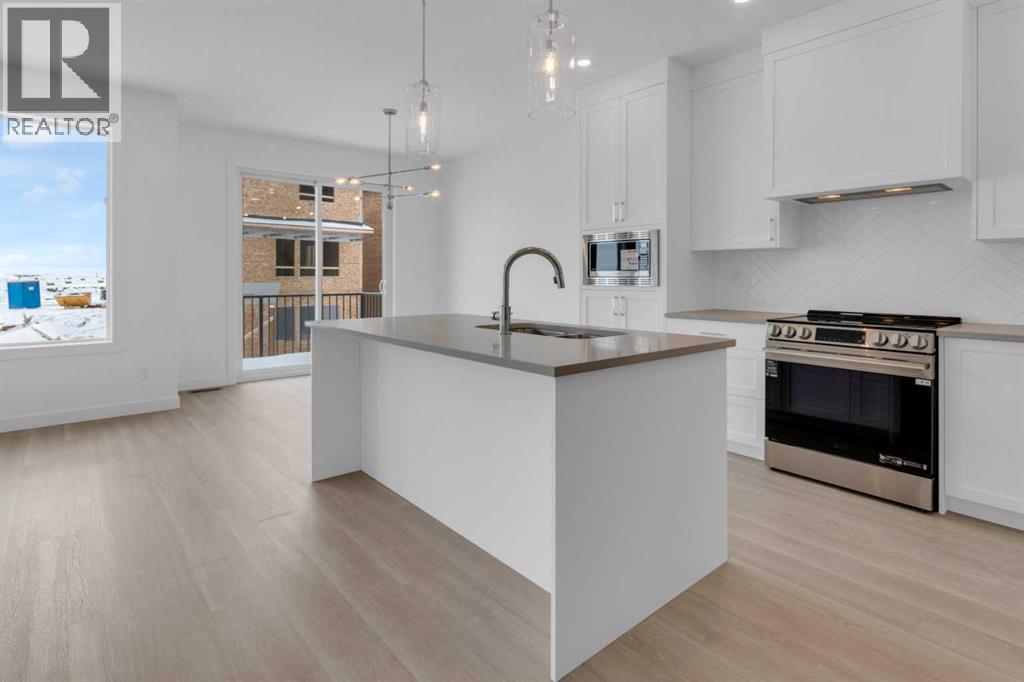 1321 South Point Parade SW, Airdrie, Alberta  T4B 0Y7 - Photo 6 - A2272934