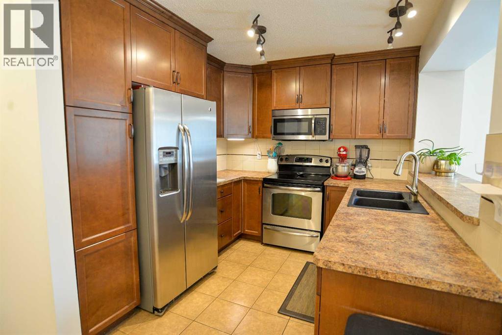 3110 Windsong Boulevard SW, Airdrie, Alberta  T4B 3R7 - Photo 11 - A2302396