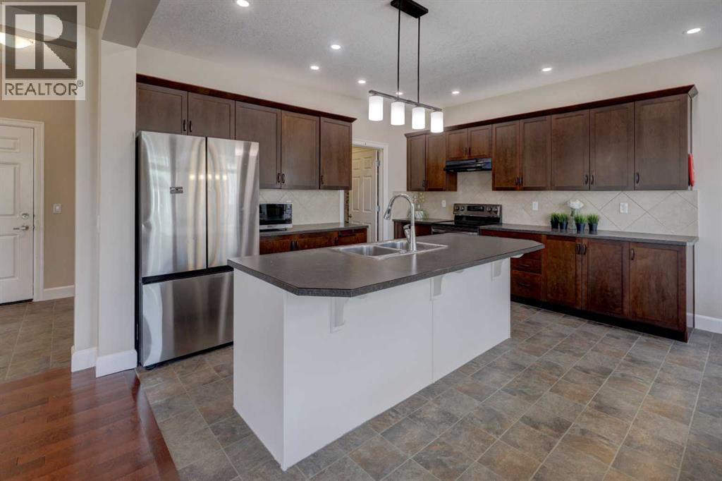 1348 Windstone Road Sw, Airdrie, Alberta  T4B 0N5 - Photo 4 - A2300418