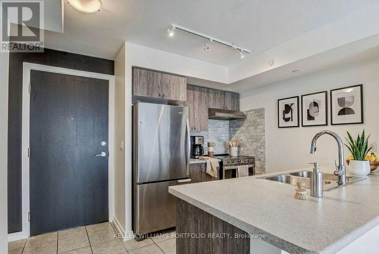 1013 - 8 Trent Avenue, Toronto, Ontario  M4C 0A6 - Photo 4 - E13021942