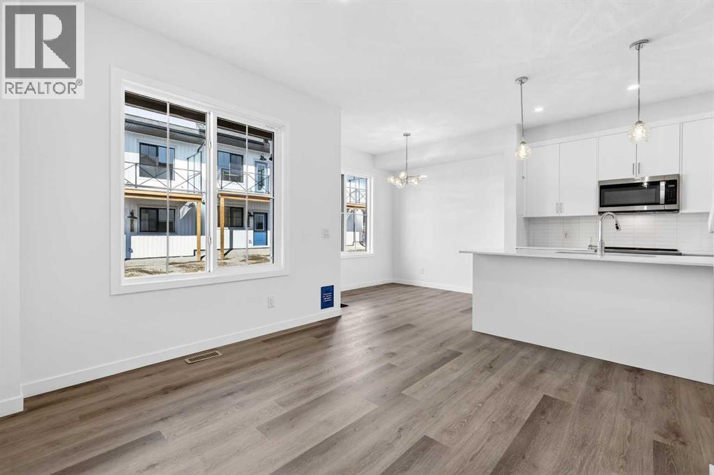 50 Creekside Way Sw, Calgary, Alberta  T2X 6E2 - Photo 7 - A2300544