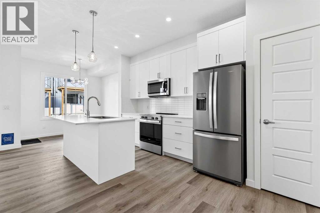 50 Creekside Way Sw, Calgary, Alberta  T2X 6E2 - Photo 9 - A2300544