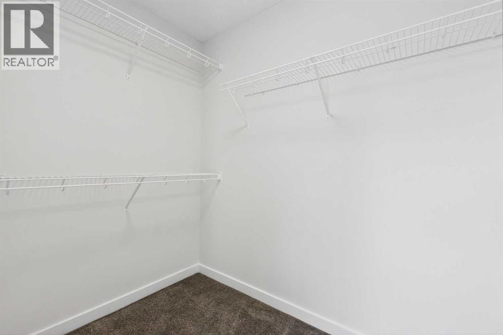 50 Creekside Way Sw, Calgary, Alberta  T2X 6E2 - Photo 24 - A2300544