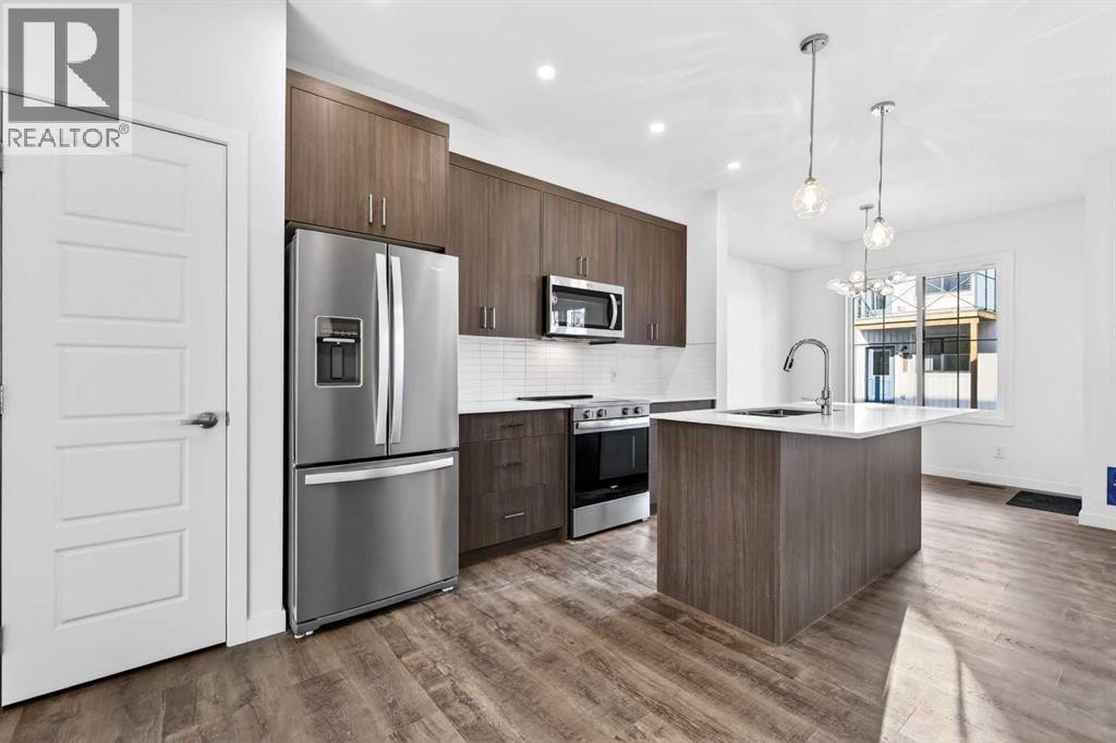 54 Creekside Way Sw, Calgary, Alberta  T2X 6E2 - Photo 11 - A2300549