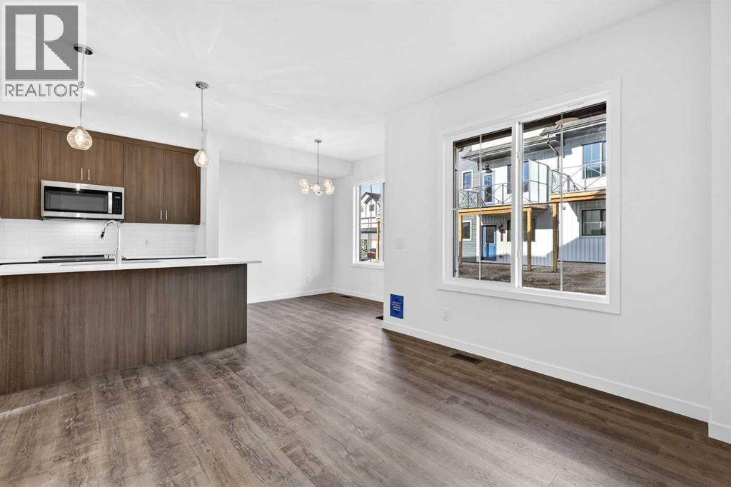 54 Creekside Way Sw, Calgary, Alberta  T2X 6E2 - Photo 8 - A2300549