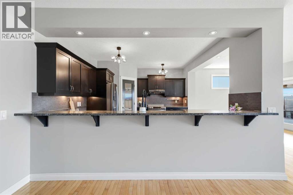 110 Heritage Place NE, Cochrane, Alberta  T4C 0E2 - Photo 5 - A2294654