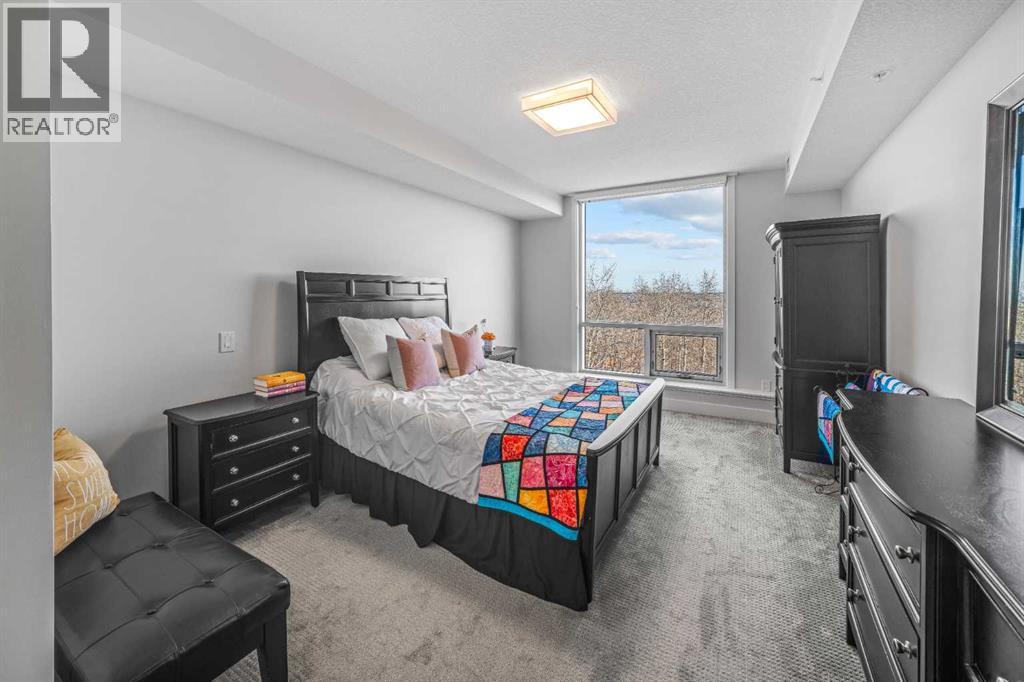 108, 15 Cougar Ridge Landing SW, Calgary, Alberta  T3H 6C3 - Photo 28 - A2296193