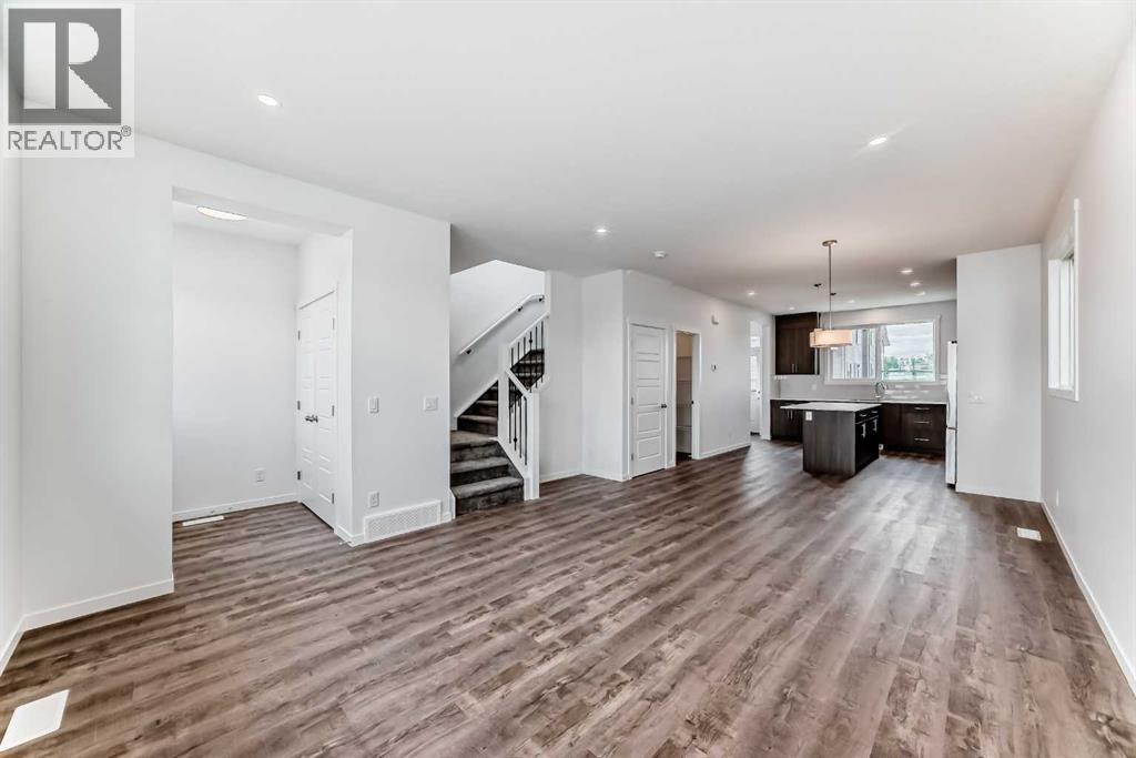 72 Wedderburn Drive, Okotoks, Alberta  T1S 5X2 - Photo 6 - A2303207