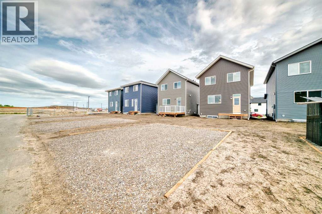 72 Wedderburn Drive, Okotoks, Alberta  T1S 5X2 - Photo 30 - A2303207