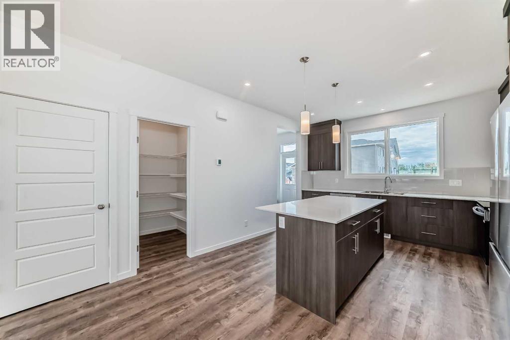 72 Wedderburn Drive, Okotoks, Alberta  T1S 5X2 - Photo 12 - A2303207