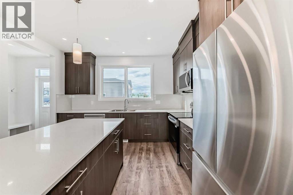 72 Wedderburn Drive, Okotoks, Alberta  T1S 5X2 - Photo 13 - A2303207