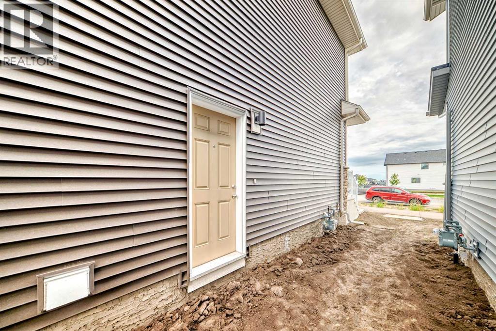 72 Wedderburn Drive, Okotoks, Alberta  T1S 5X2 - Photo 32 - A2303207