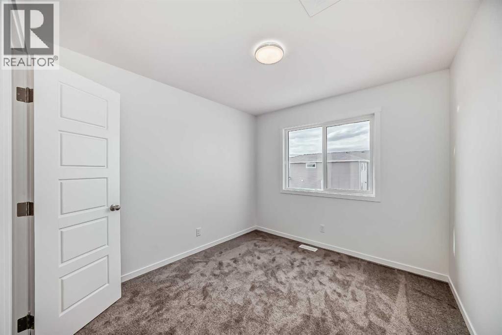 72 Wedderburn Drive, Okotoks, Alberta  T1S 5X2 - Photo 20 - A2303207