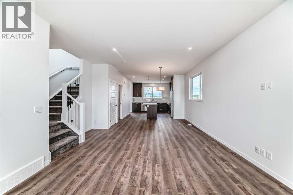 72 Wedderburn Drive, Okotoks, Alberta  T1S 5X2 - Photo 4 - A2303207