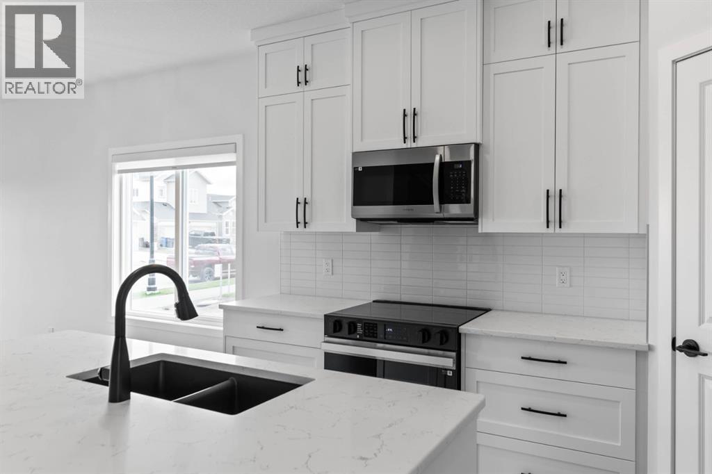 231 Vista Road, Crossfield, Alberta  T0M 0S0 - Photo 12 - A2298496