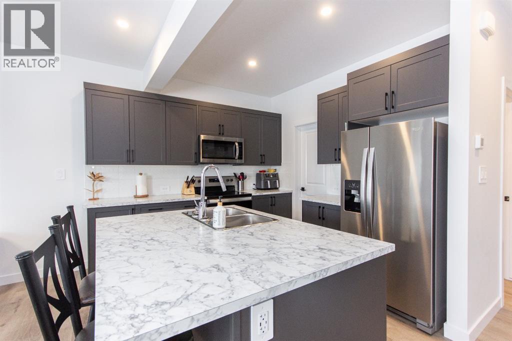 66 Henderson Crescent, Penhold, Alberta  T0M 1R0 - Photo 3 - A2290633