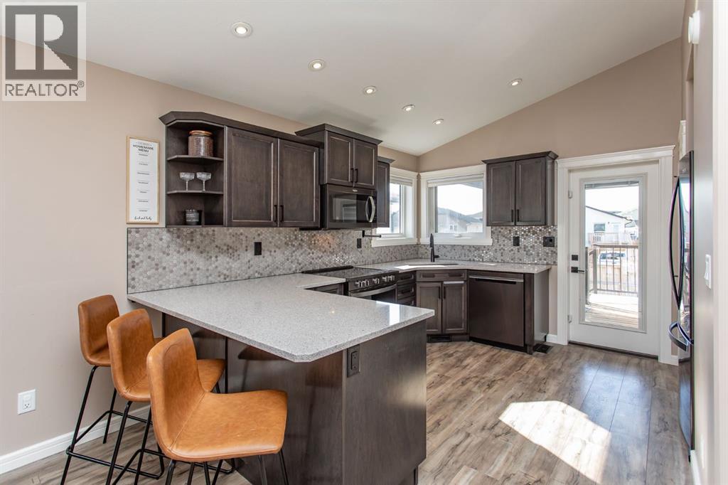 65 Mackenzie Avenue, Lacombe, Alberta  T4L 0H9 - Photo 9 - A2302752