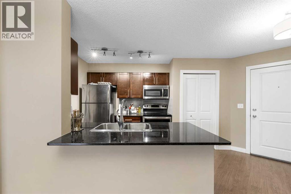 409, 5 Saddlestone Way NE, Calgary, Alberta  T3J 0S2 - Photo 4 - A2290867