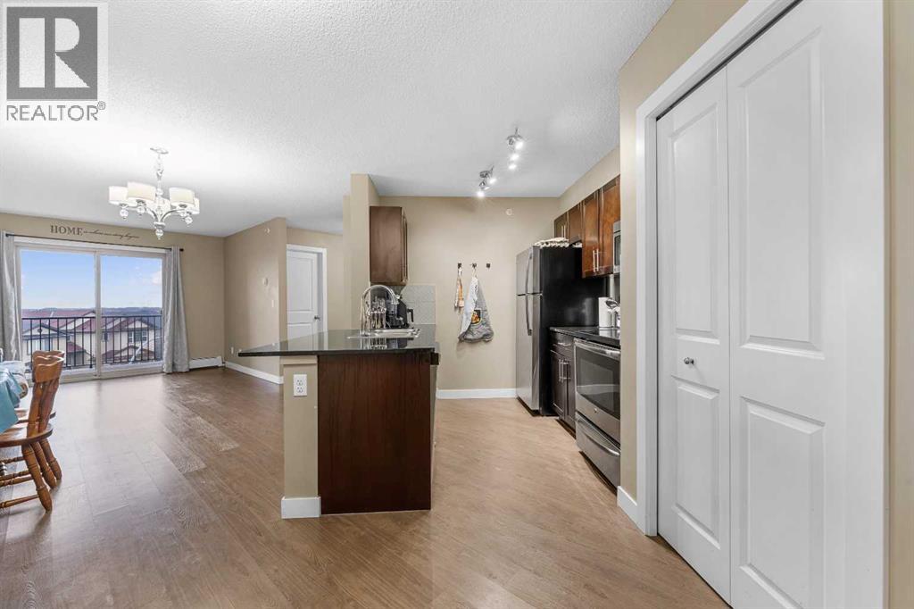 409, 5 Saddlestone Way NE, Calgary, Alberta  T3J 0S2 - Photo 3 - A2290867