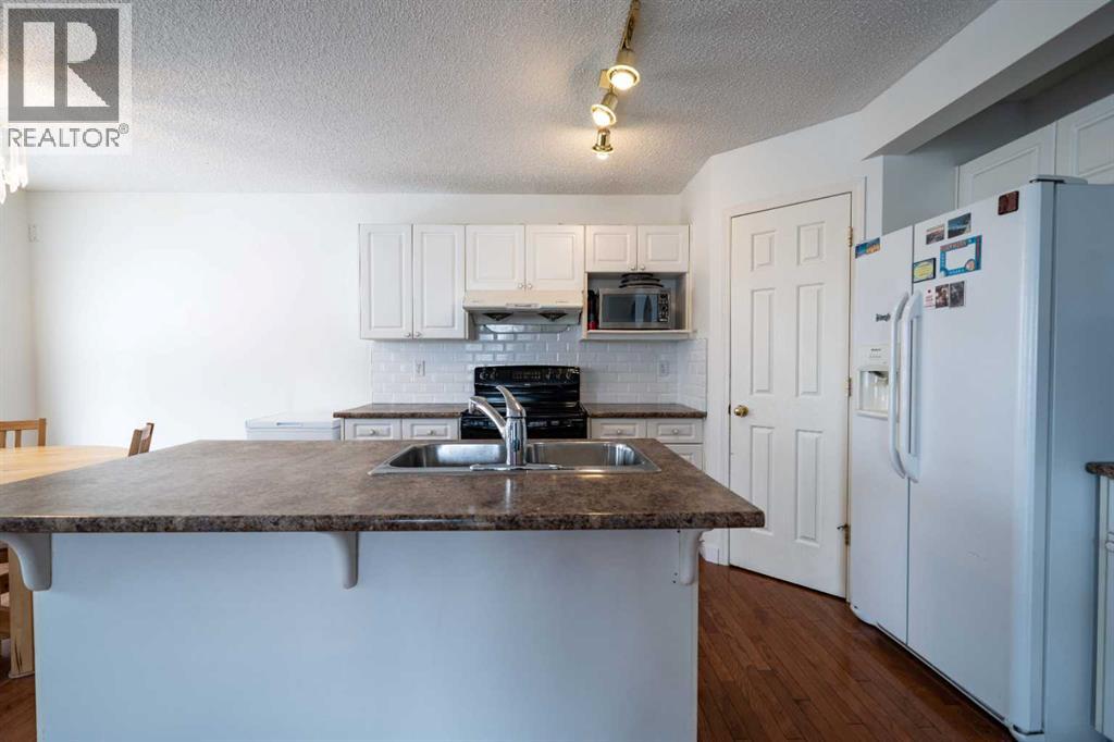 11 Arbour Stone Crescent Nw, Calgary, Alberta  T3G 4Z9 - Photo 4 - A2296317