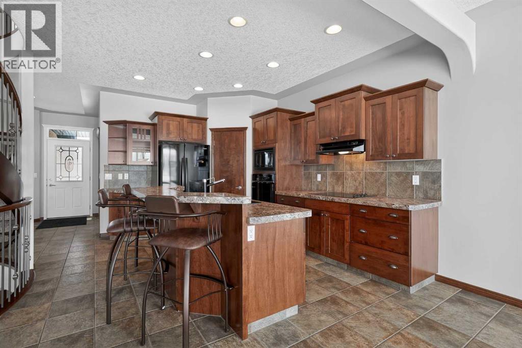 70 Panatella Circle NW, Calgary, Alberta  T3K 5Z7 - Photo 3 - A2301330