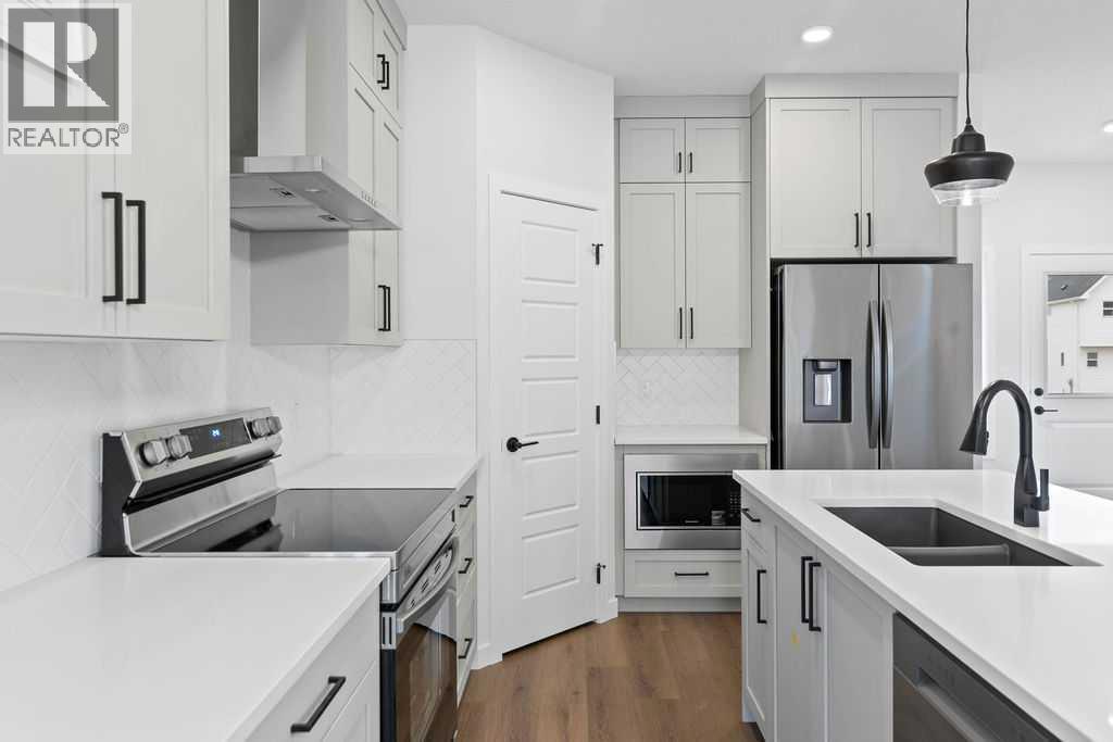 966 Chinook Winds Meadow SW, Airdrie, Alberta  T4B 5R1 - Photo 9 - A2239371