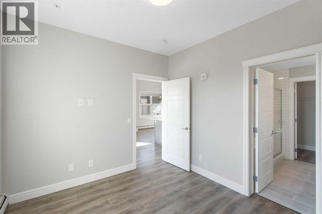 405, 19661 40 Street SE, Calgary, Alberta  T3M 3H3 - Photo 21 - A2276680