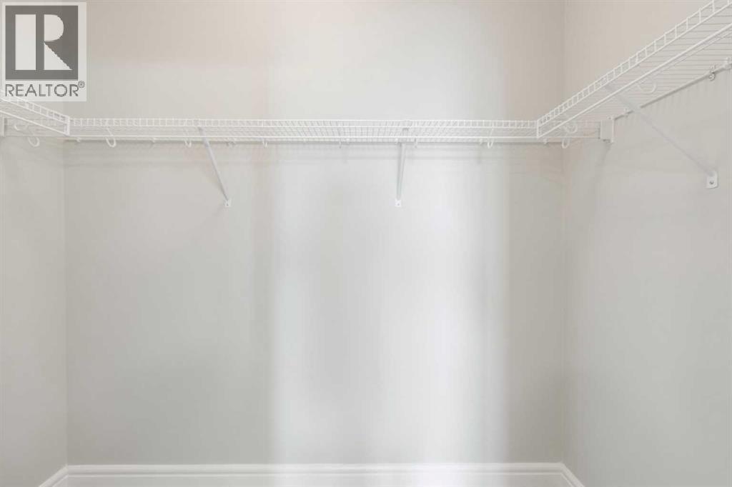 405, 19661 40 Street SE, Calgary, Alberta  T3M 3H3 - Photo 24 - A2276680