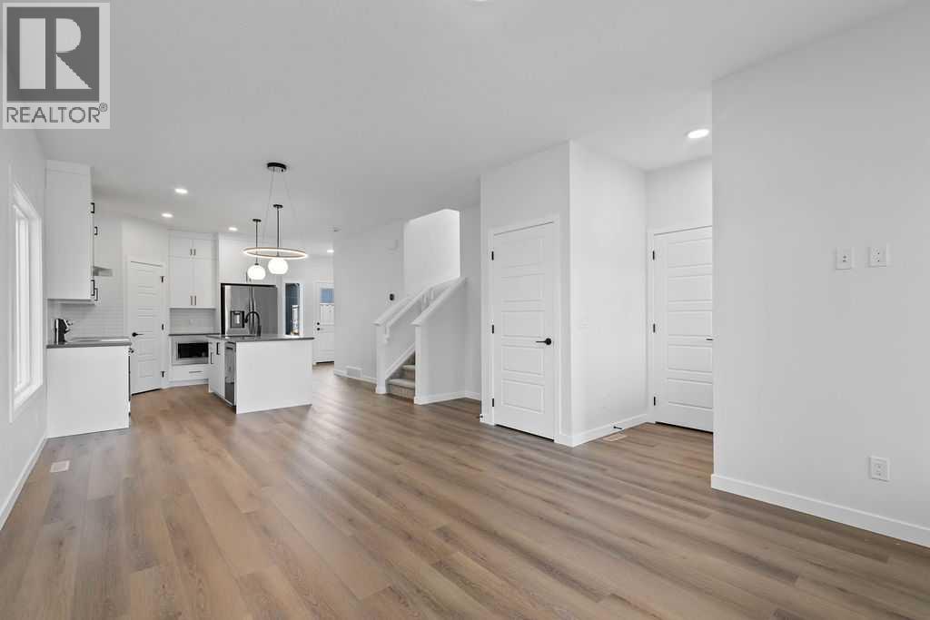 990 Chinook Winds Meadow SW, Airdrie, Alberta  T4B 5R1 - Photo 5 - A2239358