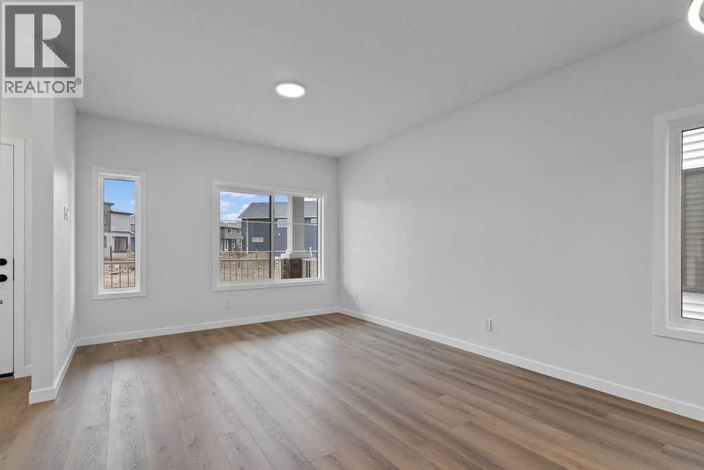 990 Chinook Winds Meadow SW, Airdrie, Alberta  T4B 5R1 - Photo 6 - A2239358