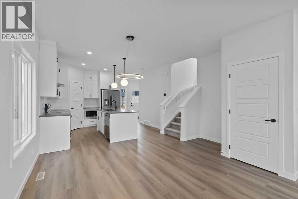 990 Chinook Winds Meadow SW, Airdrie, Alberta  T4B 5R1 - Photo 8 - A2239358