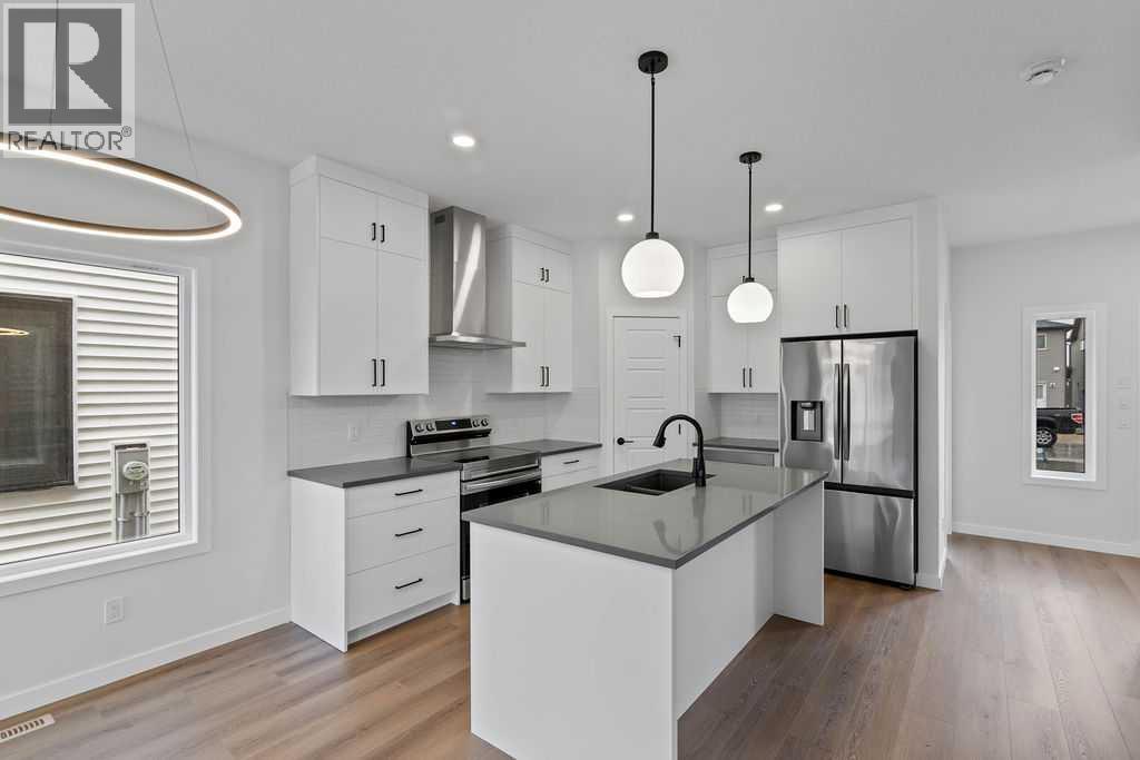 990 Chinook Winds Meadow SW, Airdrie, Alberta  T4B 5R1 - Photo 9 - A2239358