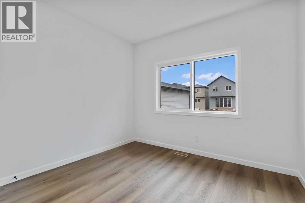 990 Chinook Winds Meadow SW, Airdrie, Alberta  T4B 5R1 - Photo 15 - A2239358