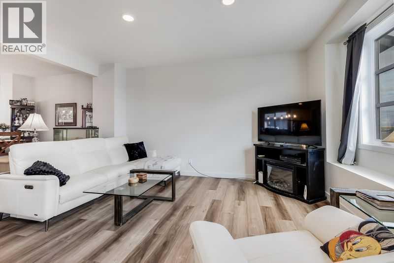 100 Langwell Common Se, Airdrie, Alberta  T4A 3P4 - Photo 3 - A2299660