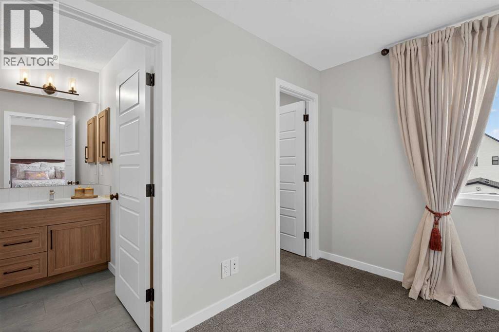 825 Reynolds Manor SW, Airdrie, Alberta  T4B 5G2 - Photo 18 - A2303362