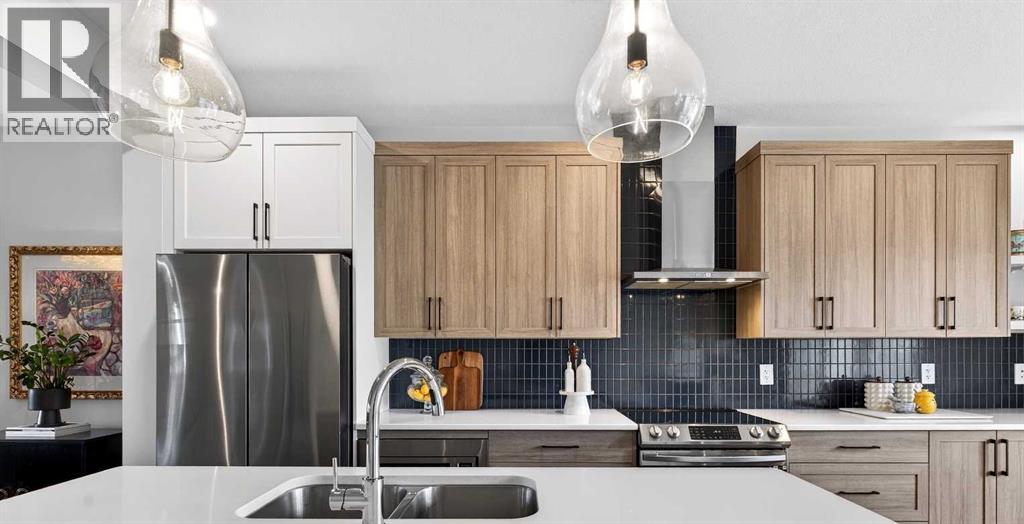 825 Reynolds Manor SW, Airdrie, Alberta  T4B 5G2 - Photo 8 - A2303362