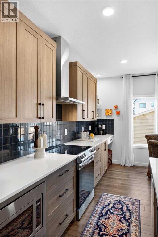 825 Reynolds Manor SW, Airdrie, Alberta  T4B 5G2 - Photo 10 - A2303362