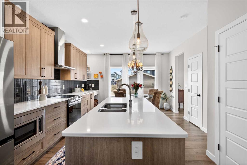 825 Reynolds Manor SW, Airdrie, Alberta  T4B 5G2 - Photo 9 - A2303362