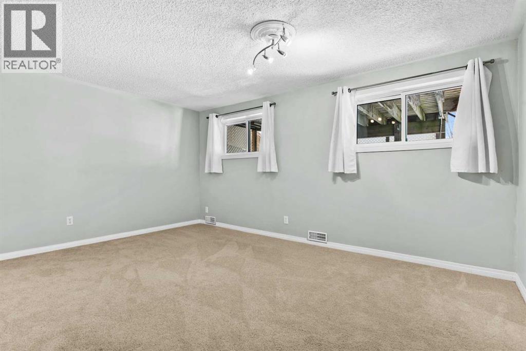 7715 67 Avenue Nw, Calgary, Alberta  T3B 4B2 - Photo 27 - A2299625