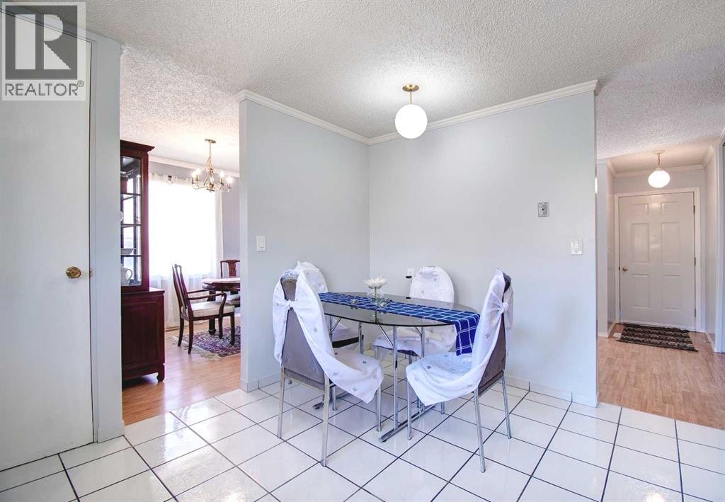 6307 Thornaby Way Nw, Calgary, Alberta  T2K 5K8 - Photo 4 - A2292423