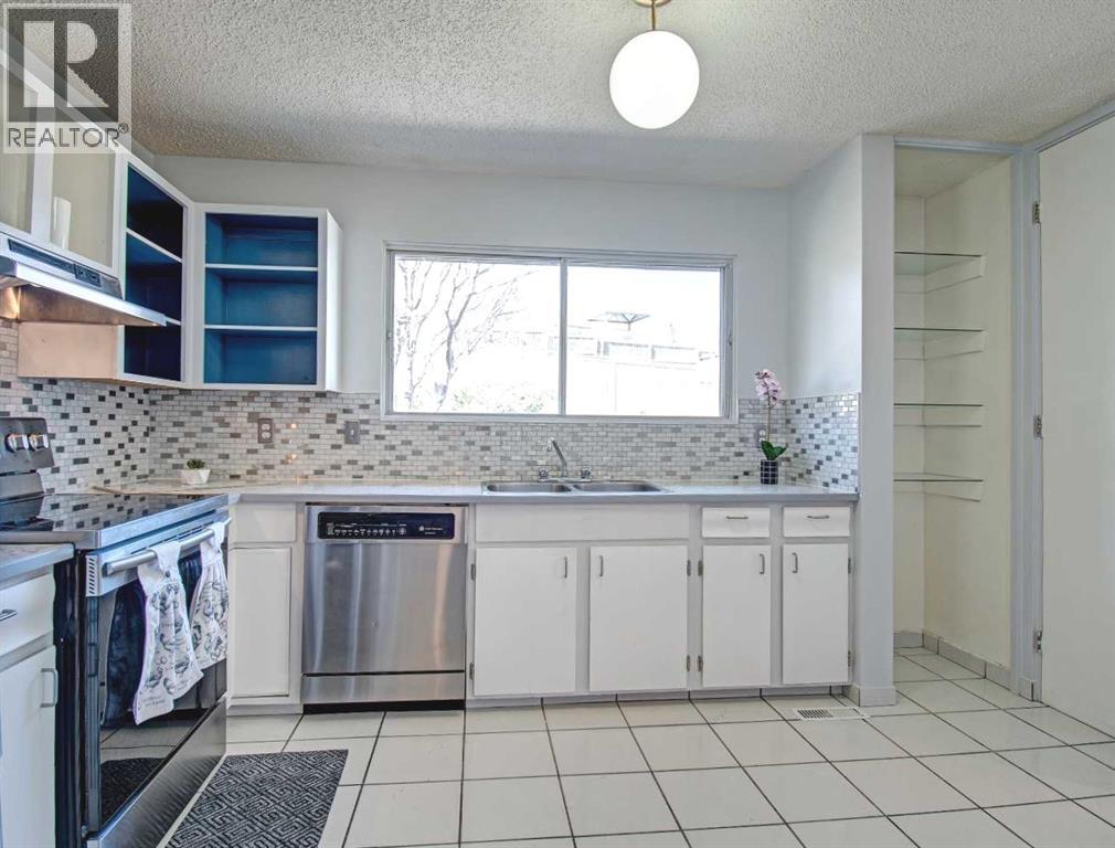 6307 Thornaby Way Nw, Calgary, Alberta  T2K 5K8 - Photo 6 - A2292423