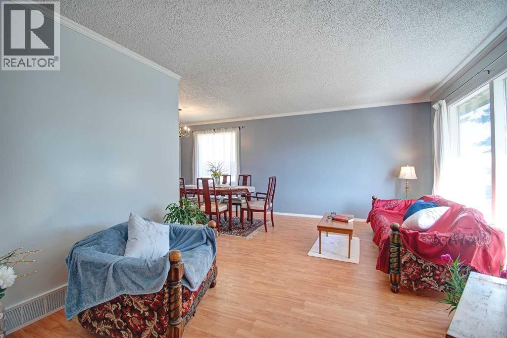 6307 Thornaby Way Nw, Calgary, Alberta  T2K 5K8 - Photo 9 - A2292423