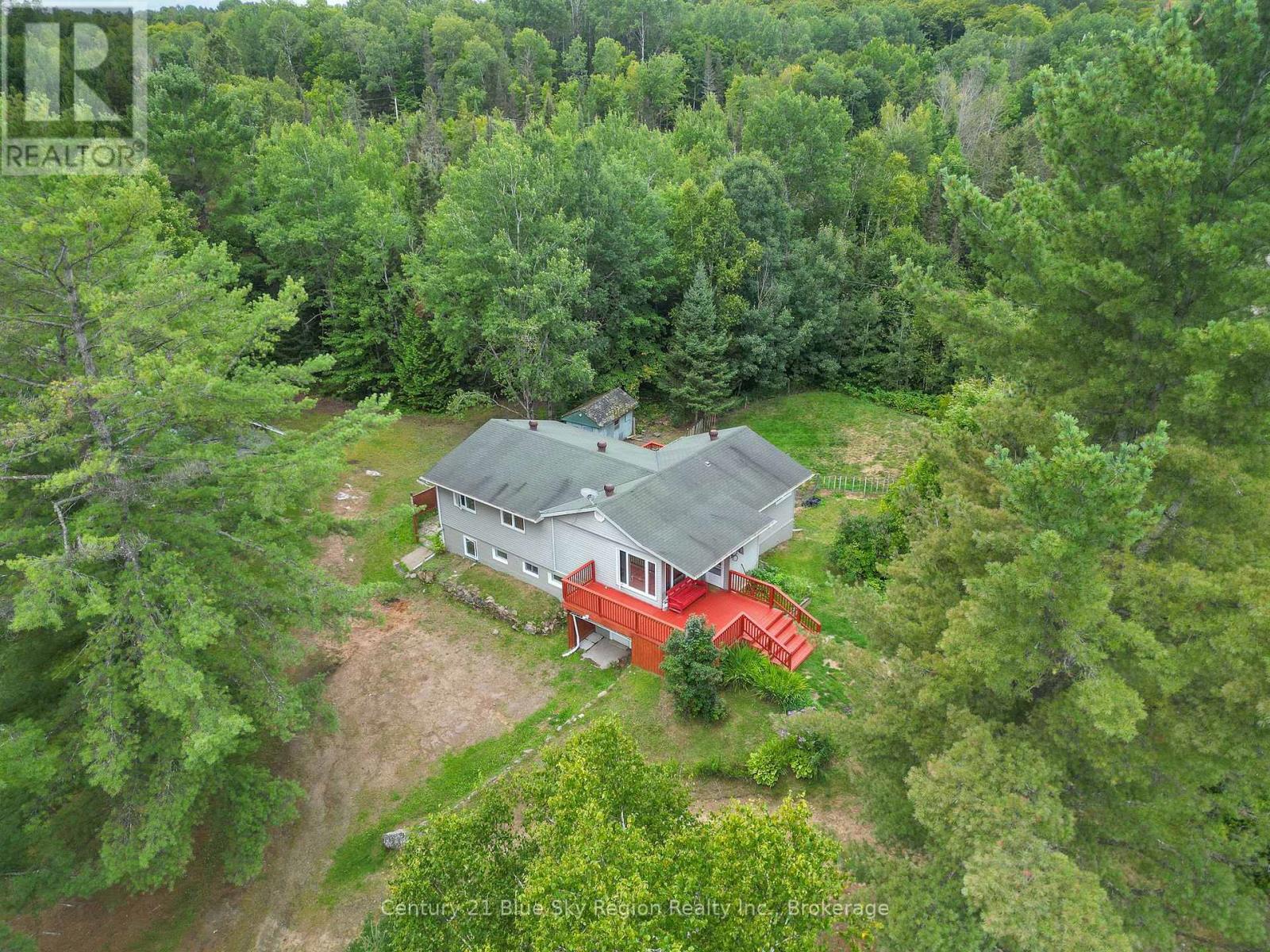 Welcome to 525 Maple Road, a large lakefront home with 5 bedrooms, 2 baths, with 1250 sq ft of living space on each floor (2) with in-law suite / rental possibilities. It is located on Kaibuskong River / Lake Nosbonsing on a large 1.9-acre lot. This is a well-maintained, beautifully landscaped lot with plenty of privacy. Entertaining is made easy with a large kitchen, two large decks, lakefront access, tons of parking, a private circular driveway, a newly rebuilt garage with a new, insulated garage door, and ample room for RV parking. Whether it's sitting on a deck sipping your morning coffee or afternoon spirit or enjoying water activities like canoeing, kayaking, boating, swimming, or fishing in the summer and skidooing in the winter, this country setting has plenty to keep you occupied while away from the hustle and bustle of city life, yet only 20 minutes from North Bay with all its amenities. Inside, we have a large 5-bedroom, 2-bathroom home. The main level has a large eat-in kitchen with new high-end Kitchen-Aid appliances, 3 bedrooms, a bathroom with laundry hookups, updated electrical and lighting, and beautiful wood ceiling fans added to each room. The main floor has large windows that flood the rooms with natural light. The lower level has two bedrooms, a hot tub room, a large living room, and a separate laundry room. Additional upgrades include lower-level lighting, a whole-house water filtration system, pumps, a pressure tank, a water heater, and roofing above the hot tub room. The septic was installed in 2020. It's hard to find a large home with acreage and on the lake, so don't wait. This property won't last. Just move in and start enjoying lakefront living. (id:48254)