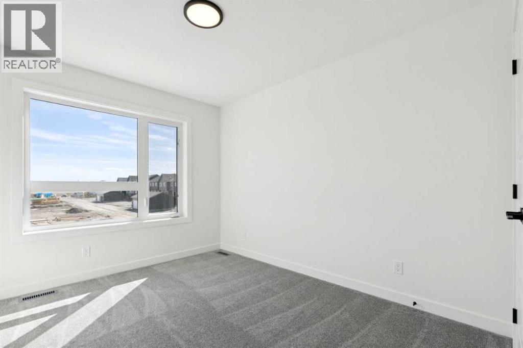 240 Layton Link SE, Airdrie, Alberta  T4A 3R7 - Photo 19 - A2284664