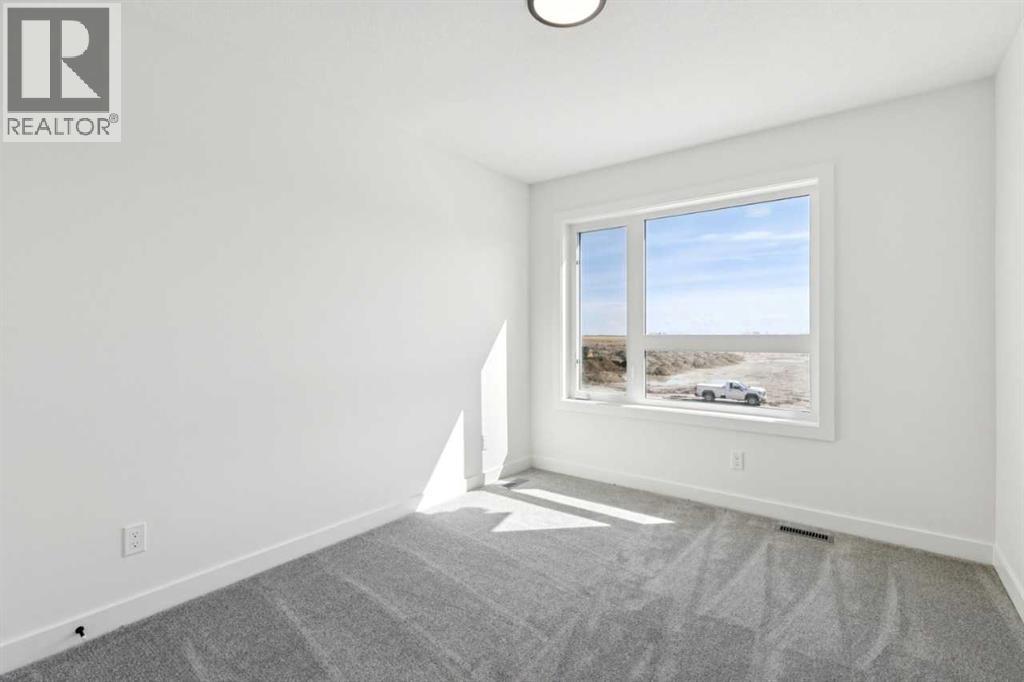 240 Layton Link SE, Airdrie, Alberta  T4A 3R7 - Photo 20 - A2284664