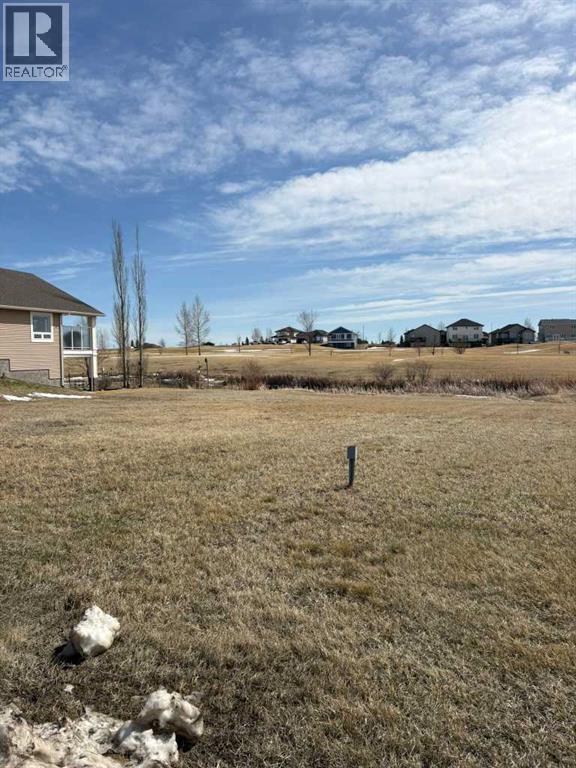 709 Whispering Greens Avenue, Vulcan, Alberta  T0L 2B0 - Photo 3 - A2303306