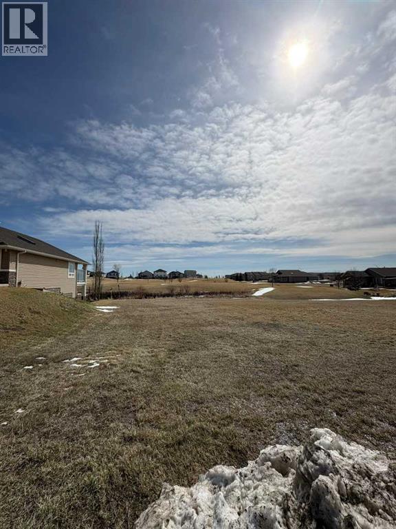 709 Whispering Greens Avenue, Vulcan, Alberta  T0L 2B0 - Photo 2 - A2303306