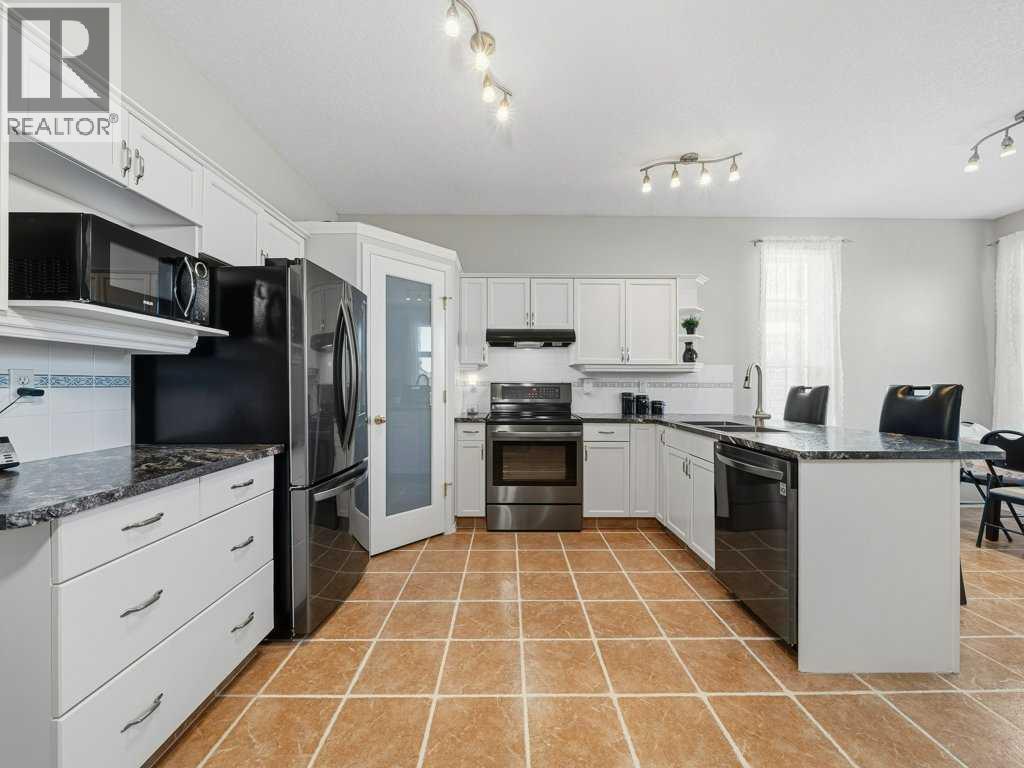 106 Springs Place Se, Airdrie, Alberta  T4A 2C9 - Photo 4 - A2285132